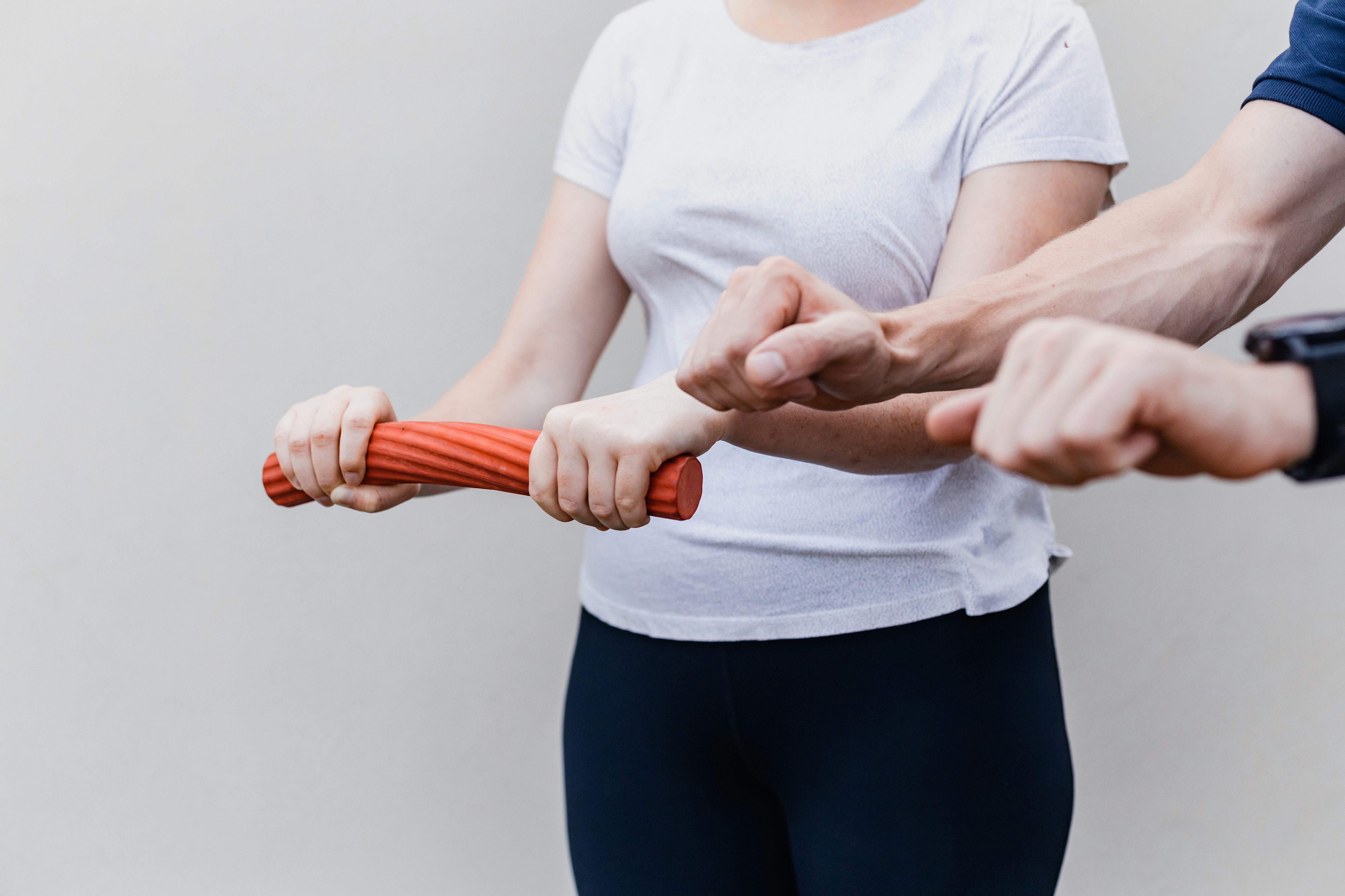 Physiotherapist helping a patient with movement